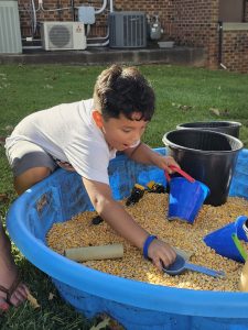 25-26 - Q1 - Event - Family Jam - Families Deer Corn Families connecting with community resources at Family Jam in Asheboro, NC